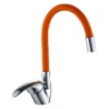 Ha3a66407562a4f3f8983acda8c1b4787m.jpg_960x960.webp Vendita diretta della fabbrica Rubinetto arancione del rubinetto della cucina del silicone Rubinetti flessibili del lavandino del bacino dell'acqua calda e fredda con il tubo arancione cromato Rubinetti della cucina dello zinco